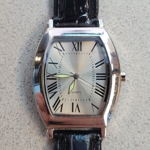 Silver dress watch in amazing condition. New battery